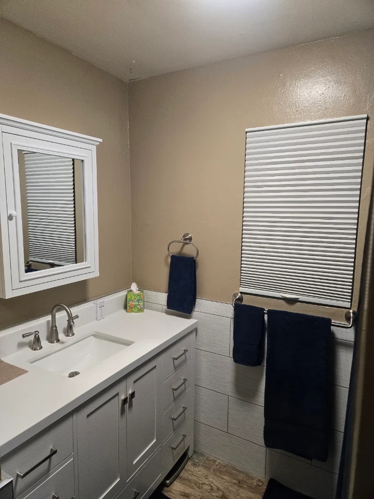 Bathroom vanity tile backsplash installation